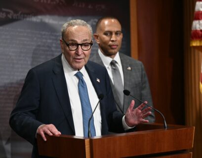 US Senate Minority Leader Chuck Schumer (L), D-NY, speaks to reporters as House Minority Leader Hakeem Jeffries, D-NY, looks on at the US Capitol in Washington, DC, on September 29, 2025, after meeting with Republican Leadership and US President Donald Trump about a potential government shutdown.