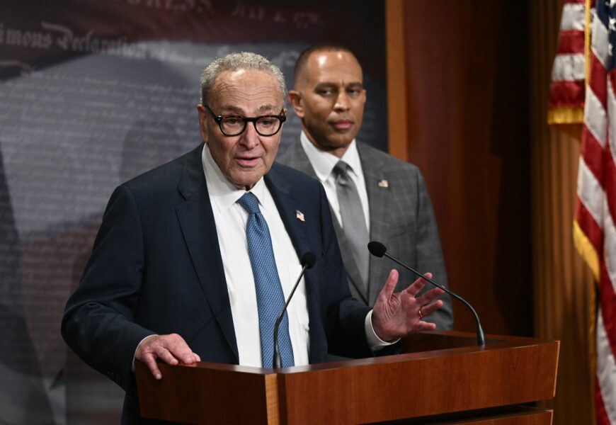 US Senate Minority Leader Chuck Schumer (L), D-NY, speaks to reporters as House Minority Leader Hakeem Jeffries, D-NY, looks on at the US Capitol in Washington, DC, on September 29, 2025, after meeting with Republican Leadership and US President Donald Trump about a potential government shutdown.