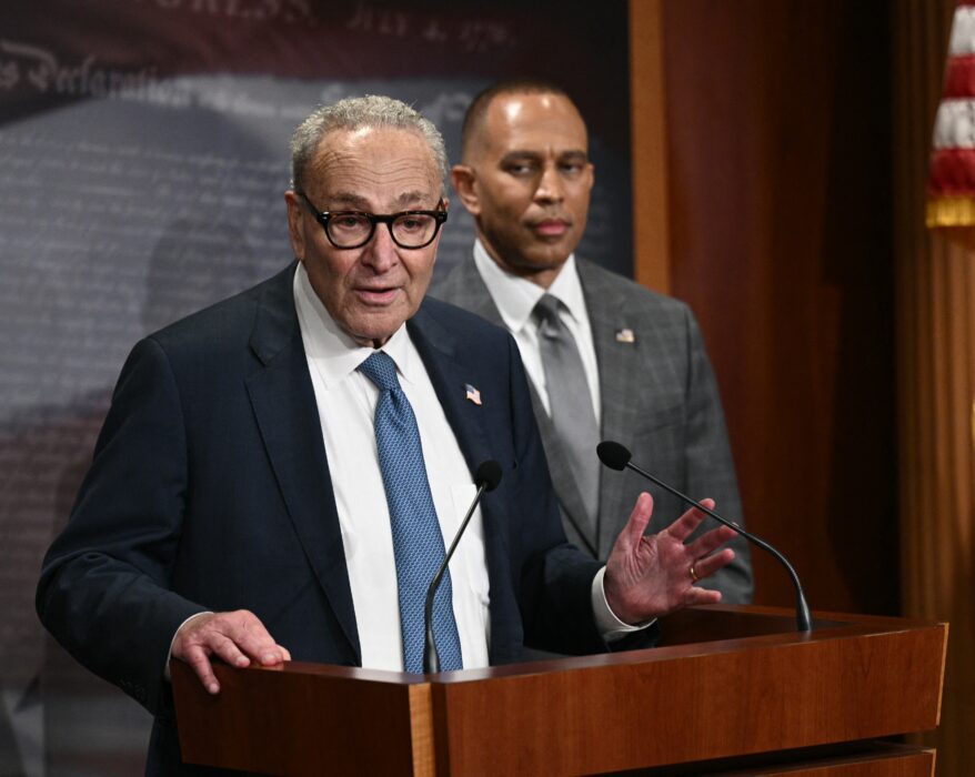 US Senate Minority Leader Chuck Schumer (L), D-NY, speaks to reporters as House Minority Leader Hakeem Jeffries, D-NY, looks on at the US Capitol in Washington, DC, on September 29, 2025, after meeting with Republican Leadership and US President Donald Trump about a potential government shutdown.